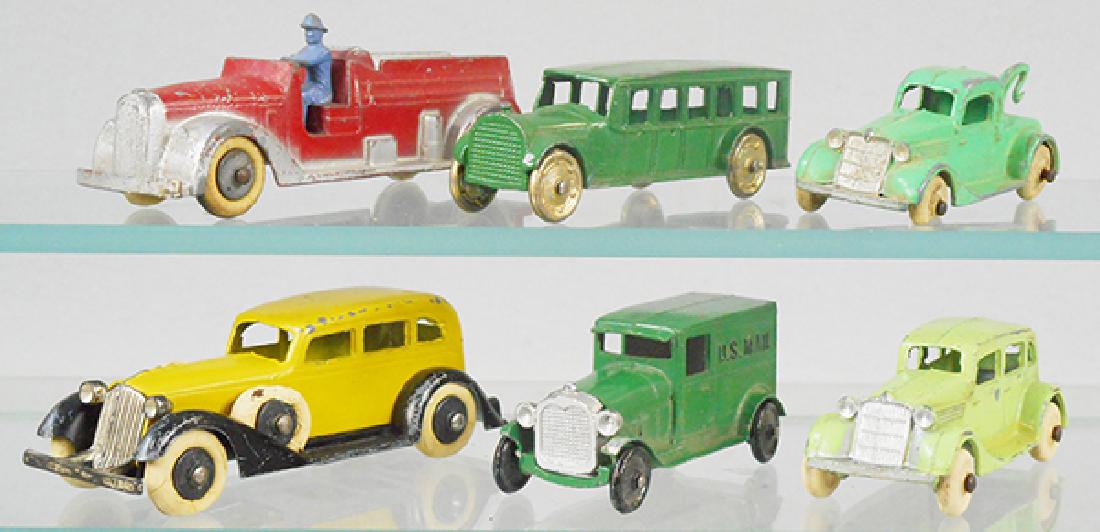 6 TOOTSIETOY VEHICLES: 1042 Insurance Patrol, tires worn, 4651 Safety Coach, 113 Ford Wrecker, 1 tire incom, oxidation on axles, 613 Graham Sedan, tires worn, Ford Model A US Mail Van, 111 Ford Sedan, color worn, C3-5.