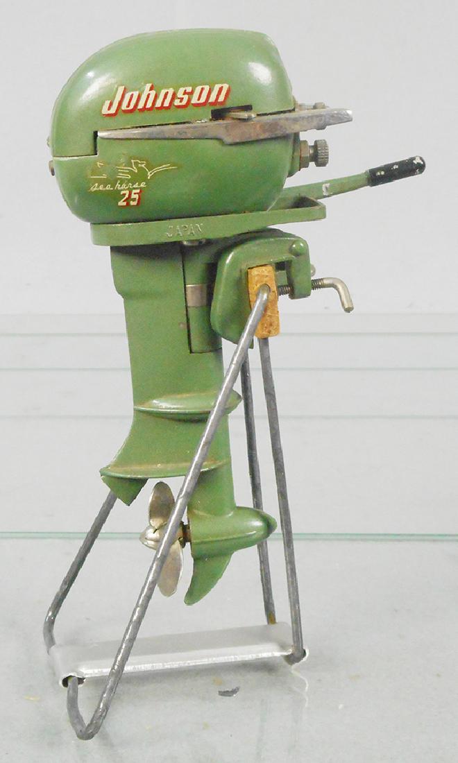 JOHNSON SEA HORSE 35 OUTBOARD MOTOR: Japan, metal, batt op, not tested, 5 1/4 in tall, 2 Sea Horse decals have wear, w/stand, C5-6.