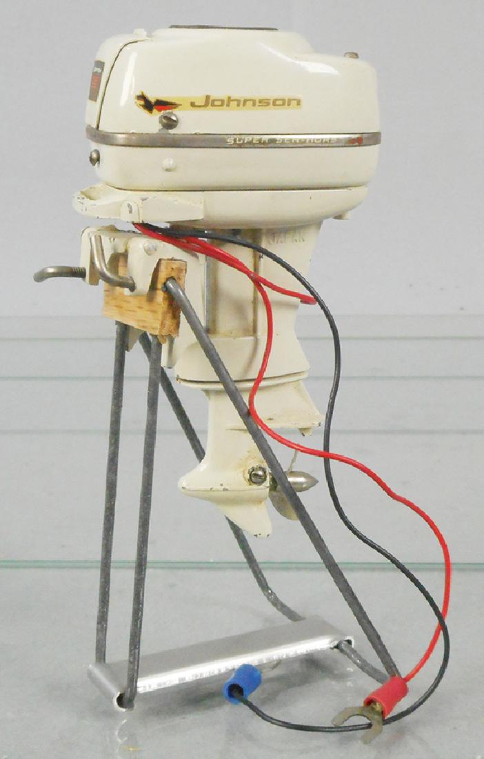 JOHNSON SUPER SEA HORSE 35 OUTBOARD MOTOR: Japan, metal, batt op, not tested, 4 1/2 in tall, w/stand, 1 clamp broken, Super Sea Horse decals worn, C5.