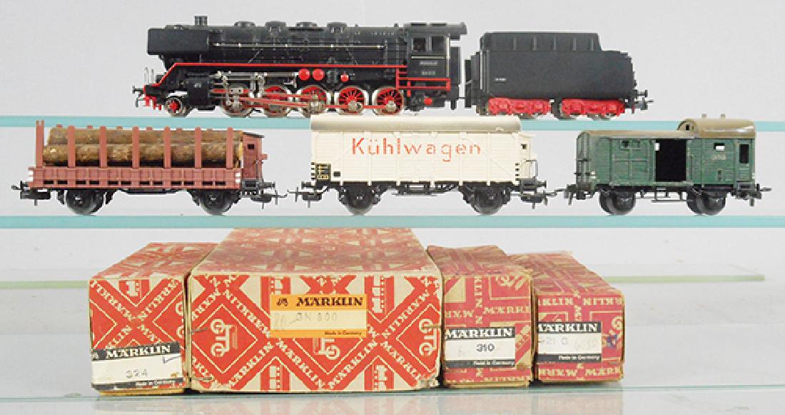 MARKLIN FREIGHT TRAIN SET: HO ga, GN800 loco & tender w/cars 321G log car, 324 Kuhlwagen, 3 paint chips on roof, 310 box car, orig boxes worn, loco & tender C8-9, cars C5-7.