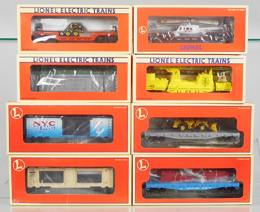 8 LIONEL FREIGHT CARS: O ga, 16767, 17516, 16660, 16968, 16710, 16958, 17517, 19671, orig boxes & inserts minor wear, 1 has end crush, C9-10.