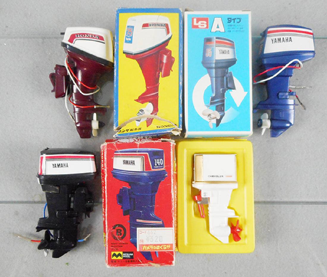 4 TOY OUTBOARD MOTORS: Japan, plastic, batt op, not tested, Yamaha #85 & #140 & Honda #75 Twin, these are each 3 3/4 in tall, orig boxes, 2 are worn, Ideal Chrysler 105, 1968, 3 in tall, orig insert bottom only, C8-9.