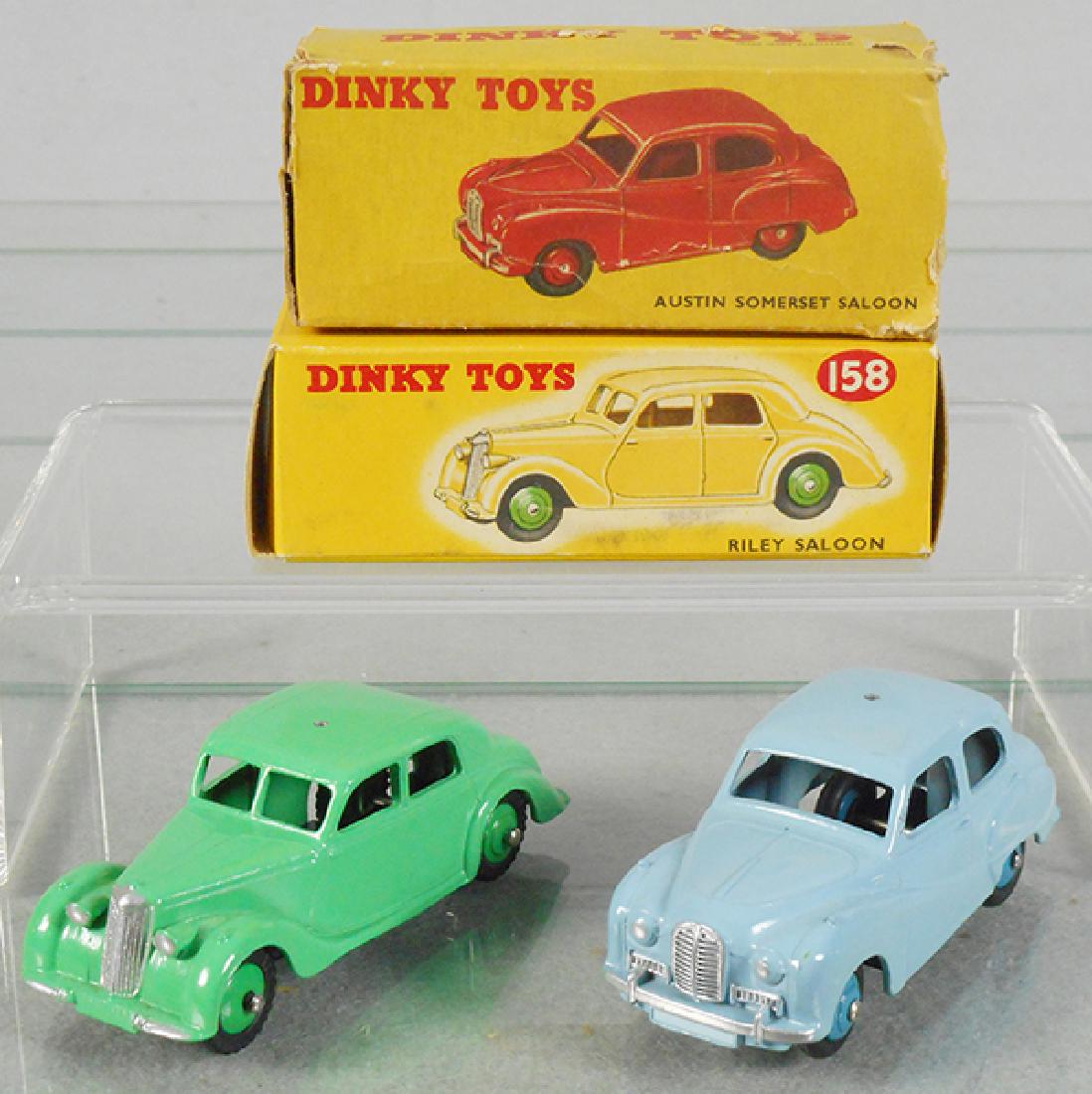2 DINKY AUTOS: 158 Riley Saloon, green, 161 Austin Somerset Saloon, blue, both have a hole drilled in roof possible for a light, orig boxes, 1 rough, C9.