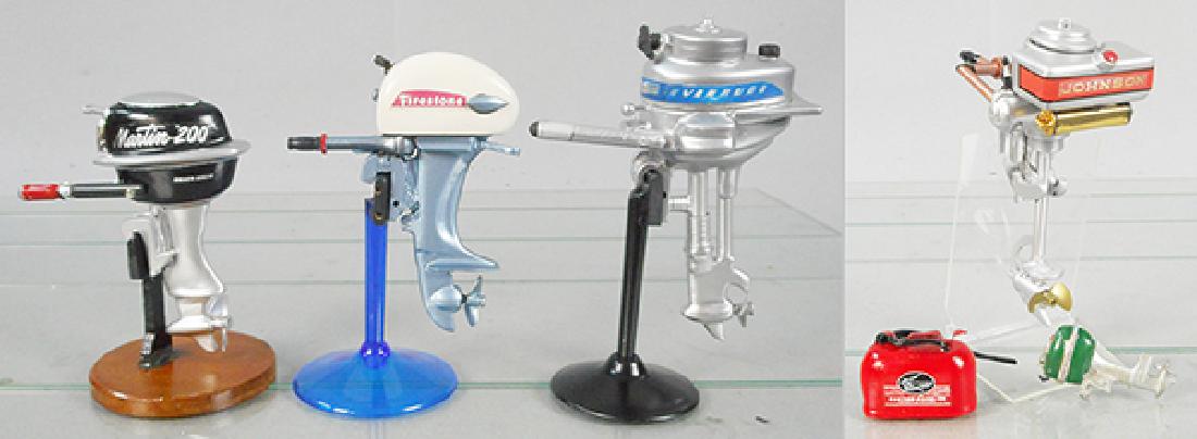 5 OUTBOARD MOTORS: resin, built from kits, Martin 200, Firestone, Evinrude, Johnson, Mercury w/gas can, 2 1/4 in to 5 1/2 in tall, w/4 stands, C6-8.