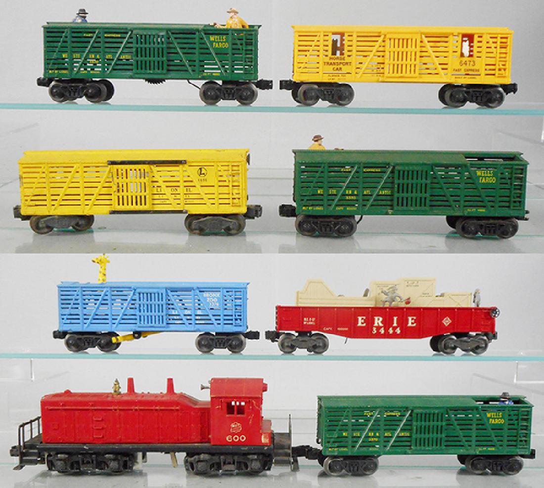 LIONEL ACTION TRAIN SET: O ga, 600 MKT switcher, 6473 horse transport, 3 #3370 Wells Fargo cars, 3376 operating giraffe car, 3444 animated gondola, 6656 stock car, C5-7.