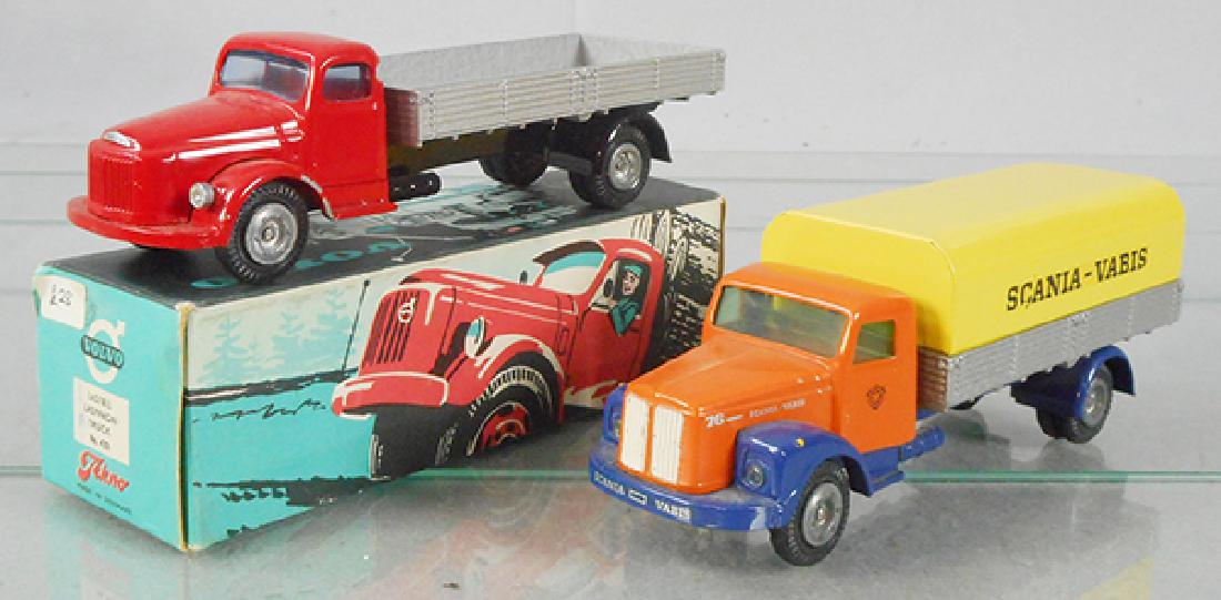 2 TEKNO TRUCKS: 432 Volvo Truck, 1 fender has chipped paint, orig box minor wear, 451 Scania Vabis Covered Truck, 2 decal chips, C7-8.