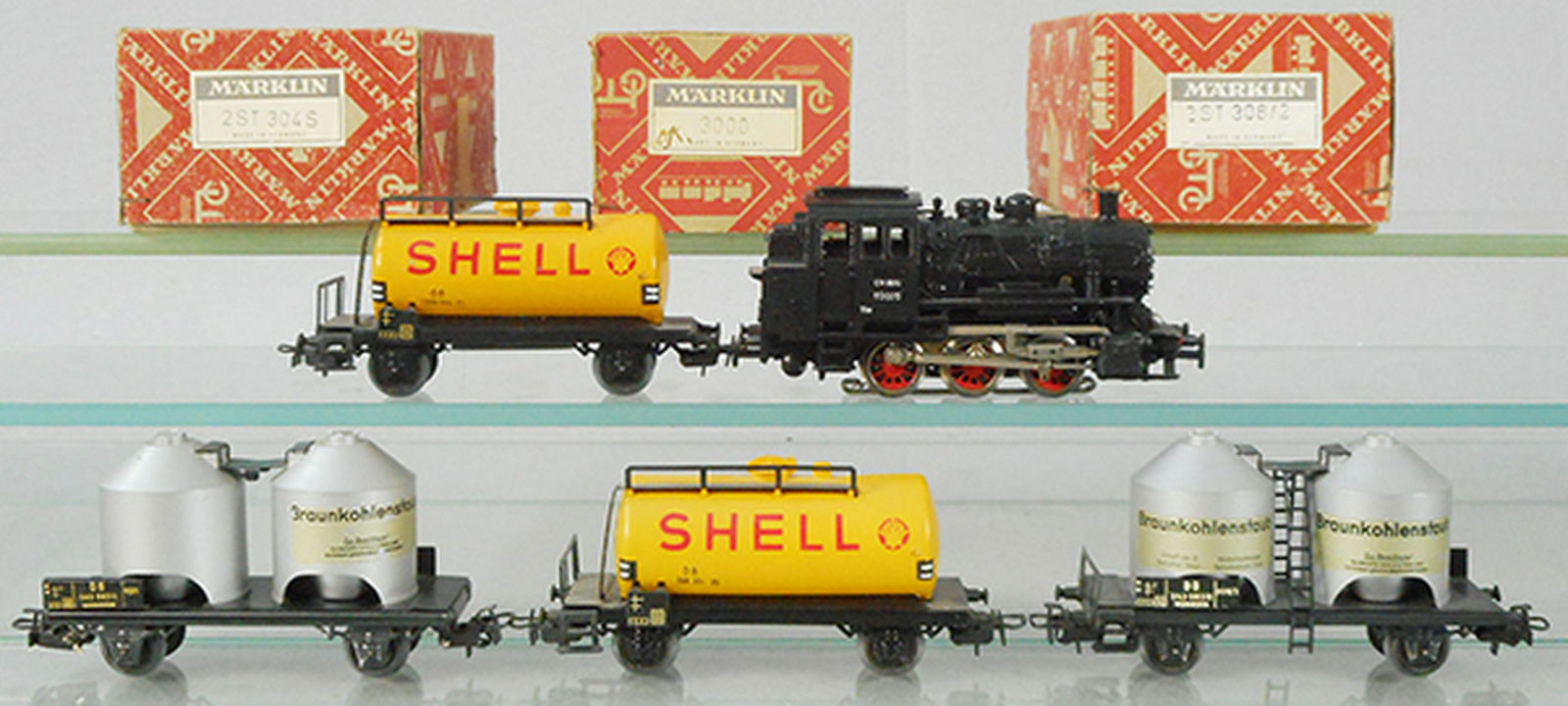 MARKLIN TRAIN SET: HO ga, 3000 loco w/304/2 Shell tankers, 308/2 container cars, orig boxes minor wear, C7-9.