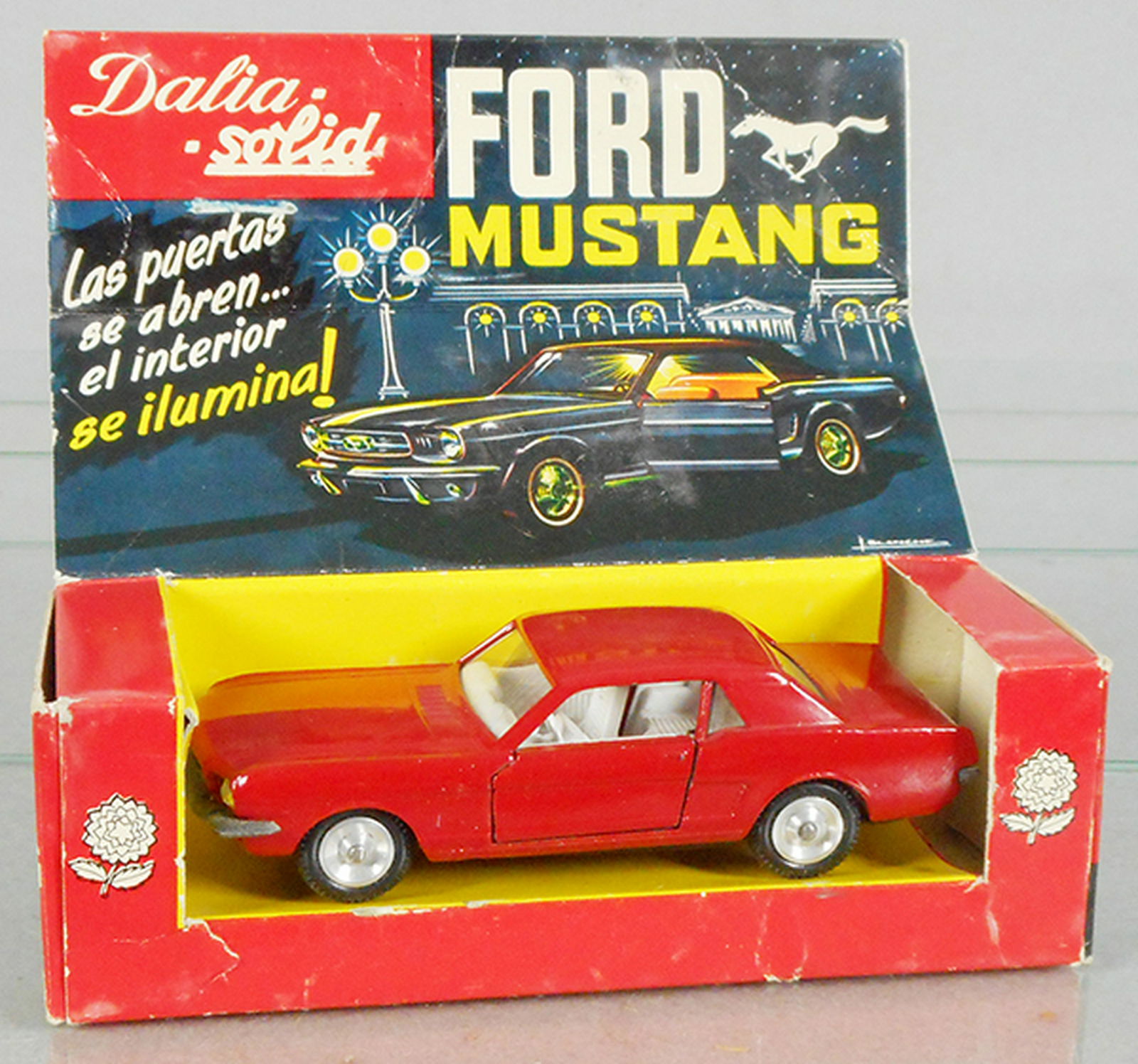 SOLIDO/DALIA 37 FORD MUSTANG: red, orig issue, w/light-up interior, bumper trim tarnished, orig box minor wear & missing 1 side insert, C8.