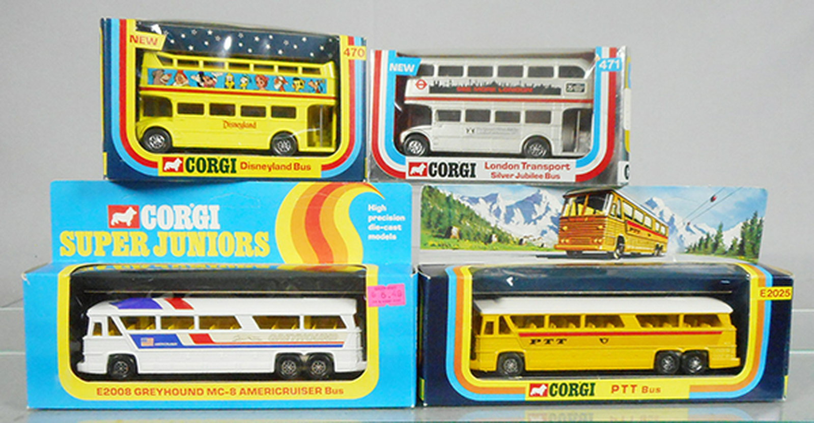 4 CORGI BUSES: 470 Disneyland, 471 Silver Jubilee, MC8 Greyhound, E2025 PTT, orig boxes & inserts minor wear, C9.