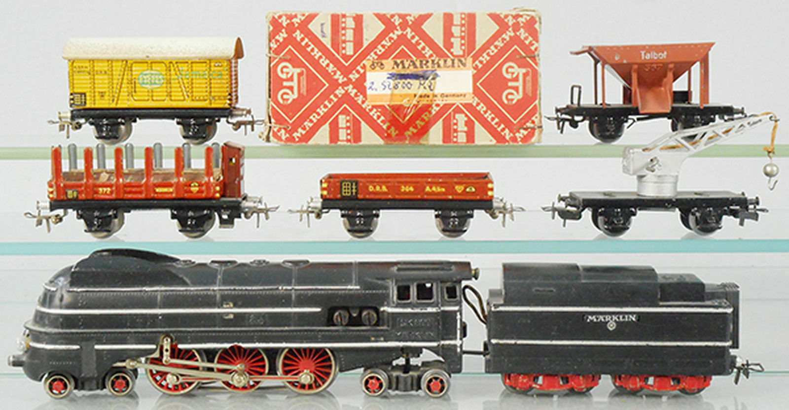 MARKLIN TRAIN SET: HO ga, SK800 loco & tender, 372 lumber, 364 gondola, 366 crane, 382 Jamaica Bananas, paint wear on roof, 367 hopper, orig loco box has graffiti on label, C5-7.