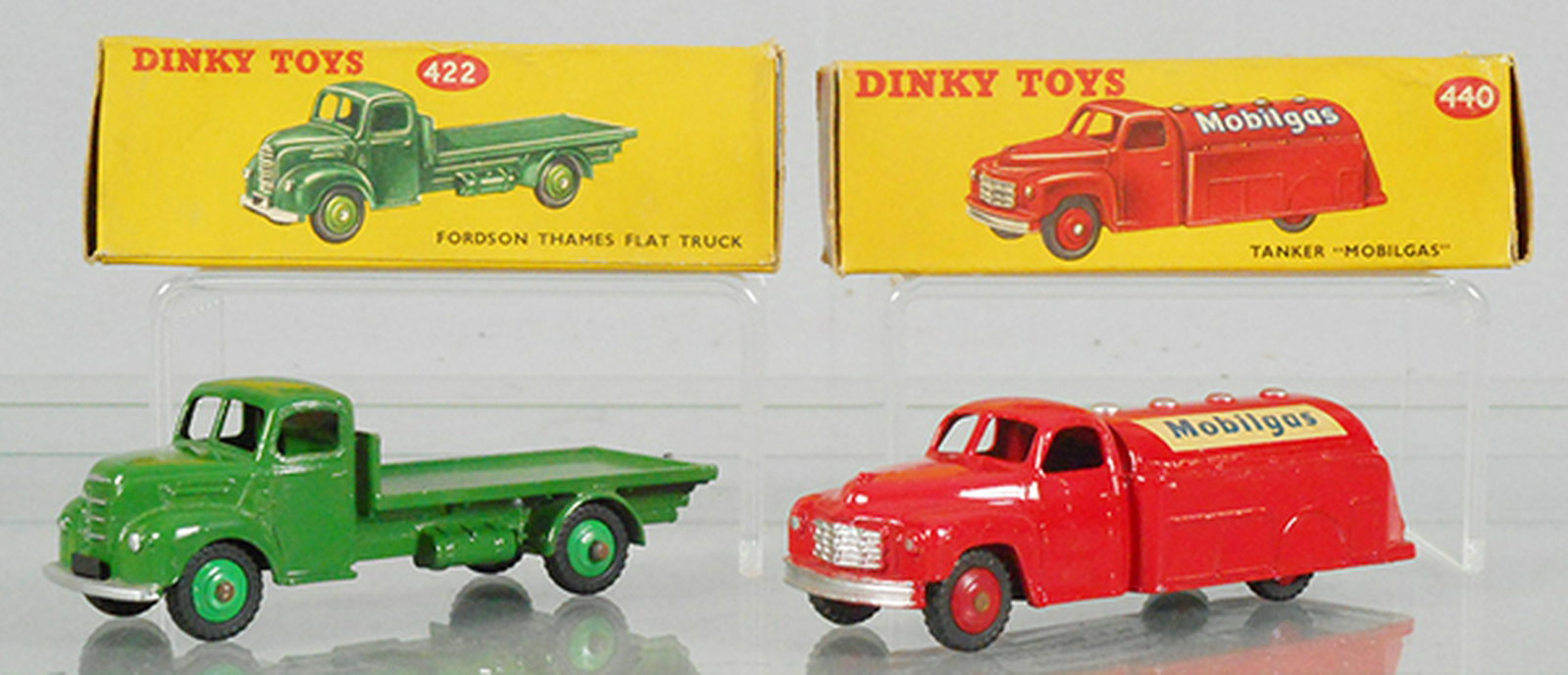 2 DINKY VEHICLES: 422 Fordson Thames Flat Truck, green, orig box minor wear, w/red color dot, 440 Mobilgas Tanker, orig box minor wear, C8-9.