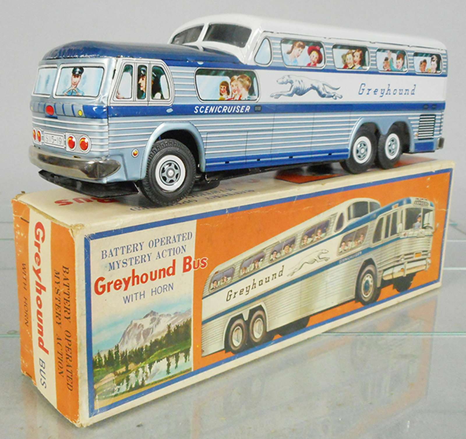 DAIYA GREYHOUND BUS: litho tin, 14 1/2 in long, battery operated, working, orig box minor wear, C8-9.