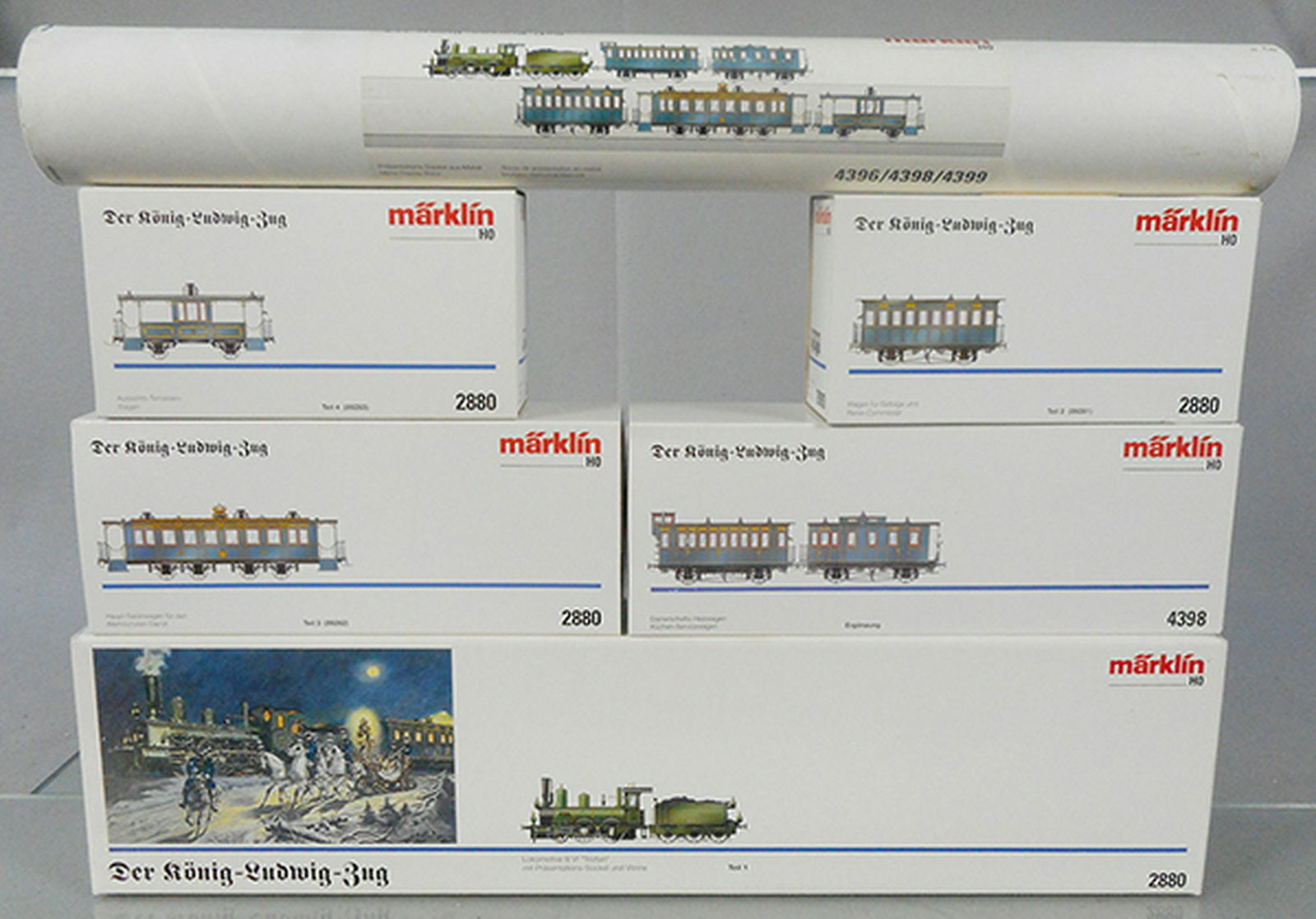 MARKLIN KING LUDWIG TRAIN SET: HO ga, 2880 Tristan loco & tender, w/orig wood display case, 2880 Commissar car, 2880 Central Saloon car, 2880 obsv, 4398 service car & kitchen car, 4396 metal display base set, orig boxes & inserts,