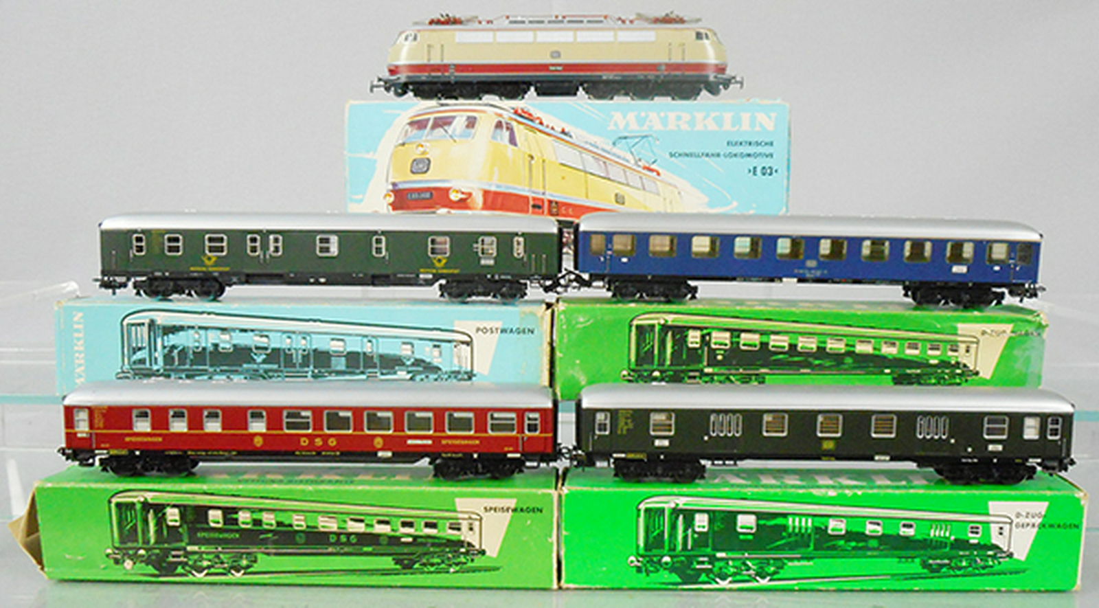 MARKLIN TRAIN SET: HO ga, 3053 loco, orig box has tape, w/cars 4026, 4024, 4047, 4023, orig car boxes worn, C7-8.