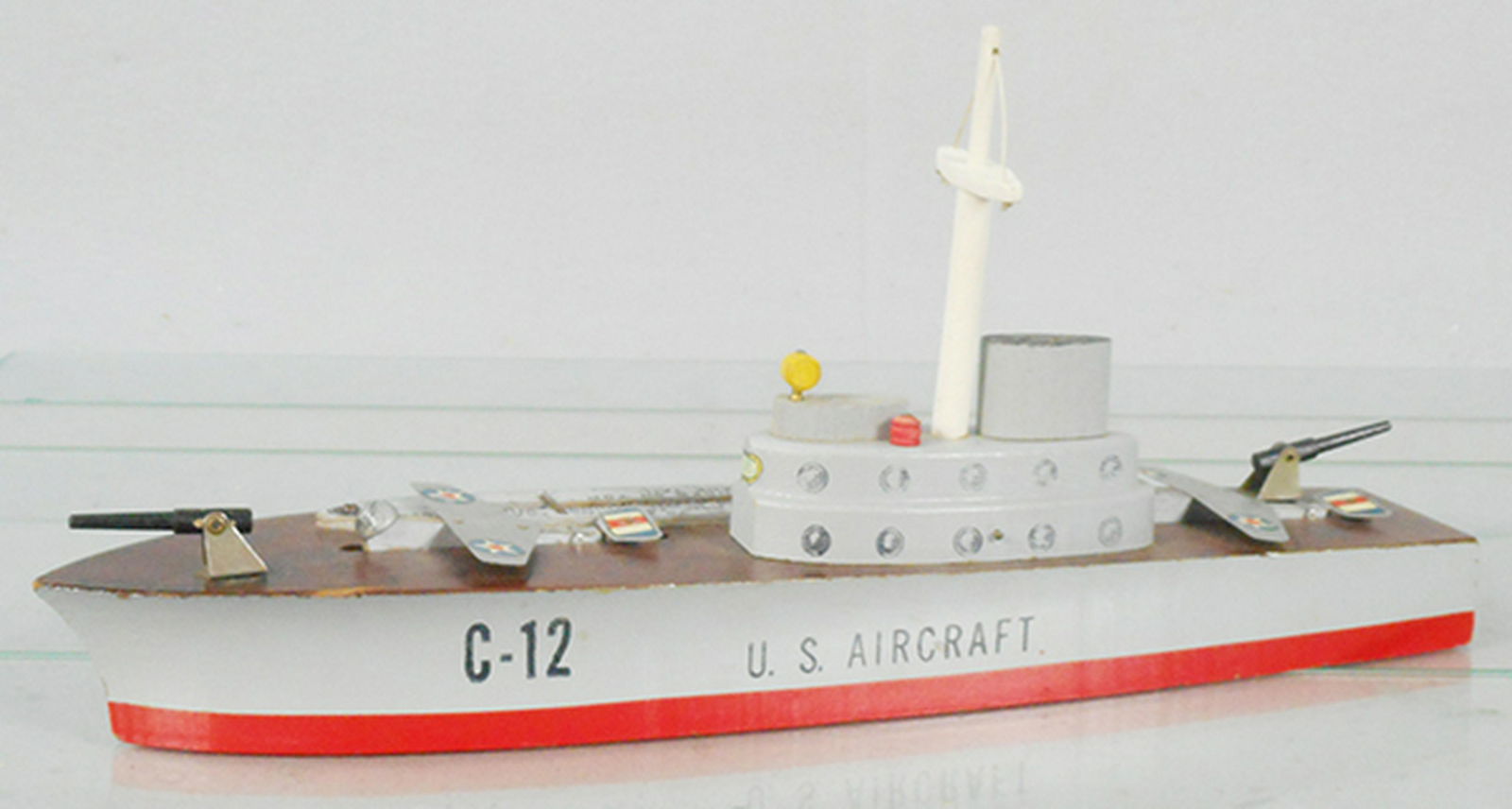 KEYSTONE AIRCRAFT CARRIER: wood, 15 1/2 in long, w/2 airplanes still stapled to deck, C7.