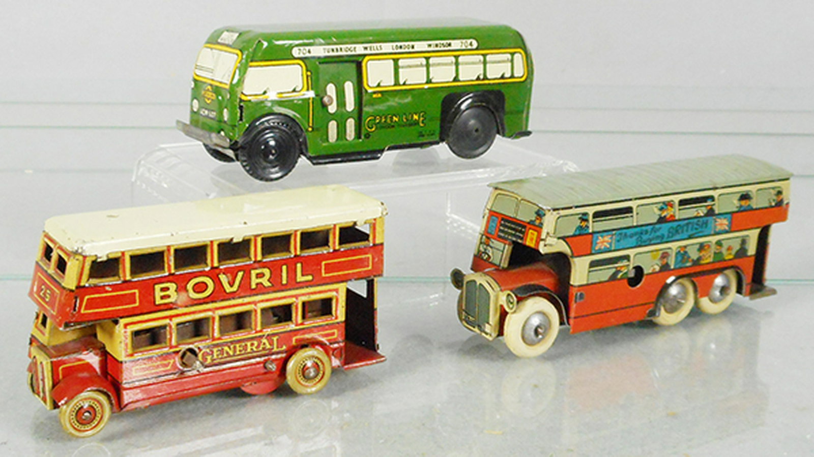 3 TOY BUSES: litho tin, Wells Greenline Bus, w/opening doors, 4 1/4 in long, friction working, Bovril Bus, windup working, 3 1/4 in long, Wells 6-wheel Bus, windup working, C7-9.