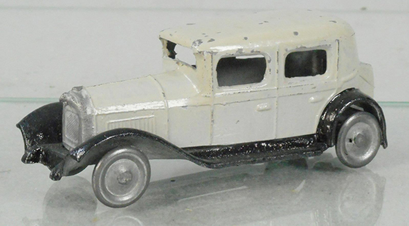 C.D. CHENARD & WALKER SEDAN: die cast, gray & black, 3 3/4 in long, w/metal disc wheels & 2 spares, marked Gennevilliers Seine, C7.