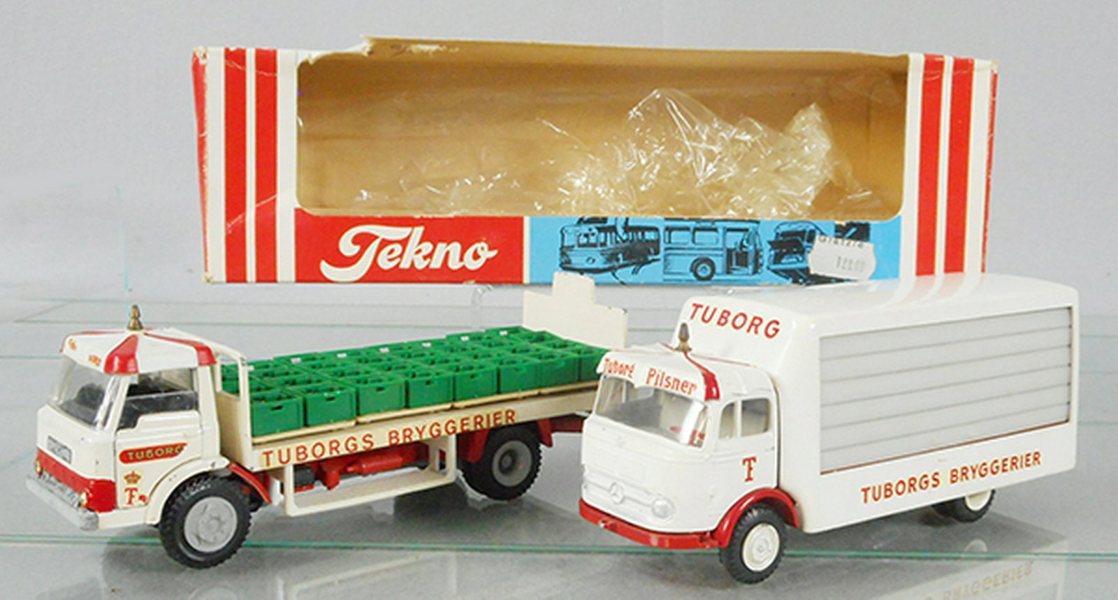 2 TEKNO TRUCKS: 918 Ford Tuborg Bier Truck, w/crates, some decal wear, orig box rough, C6-7, 913 Tuborg Delivery Truck, C7-8.
