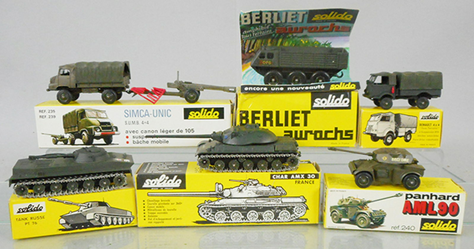 6 SOLIDO MILITARY VEHICLES: 235 Simca Unic 4X4 w/cannon, 214 Berliet Aurochs, 203 Renault 4X4, 207 Russian PT76 tank, 209 AMX 30 tank, 240 Panhard AML 90, orig boxes & inserts minor wear, C9-10.