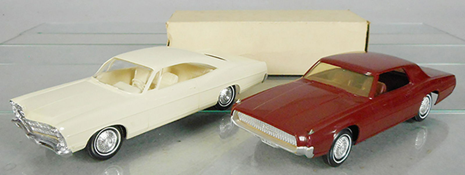 2 AMT FORD PROMOS: 1967 Galaxie 500XL, Wimbledon White, windshield post bent, orig box, 1967 Thunderbird, maroon, both are friction working, C7.