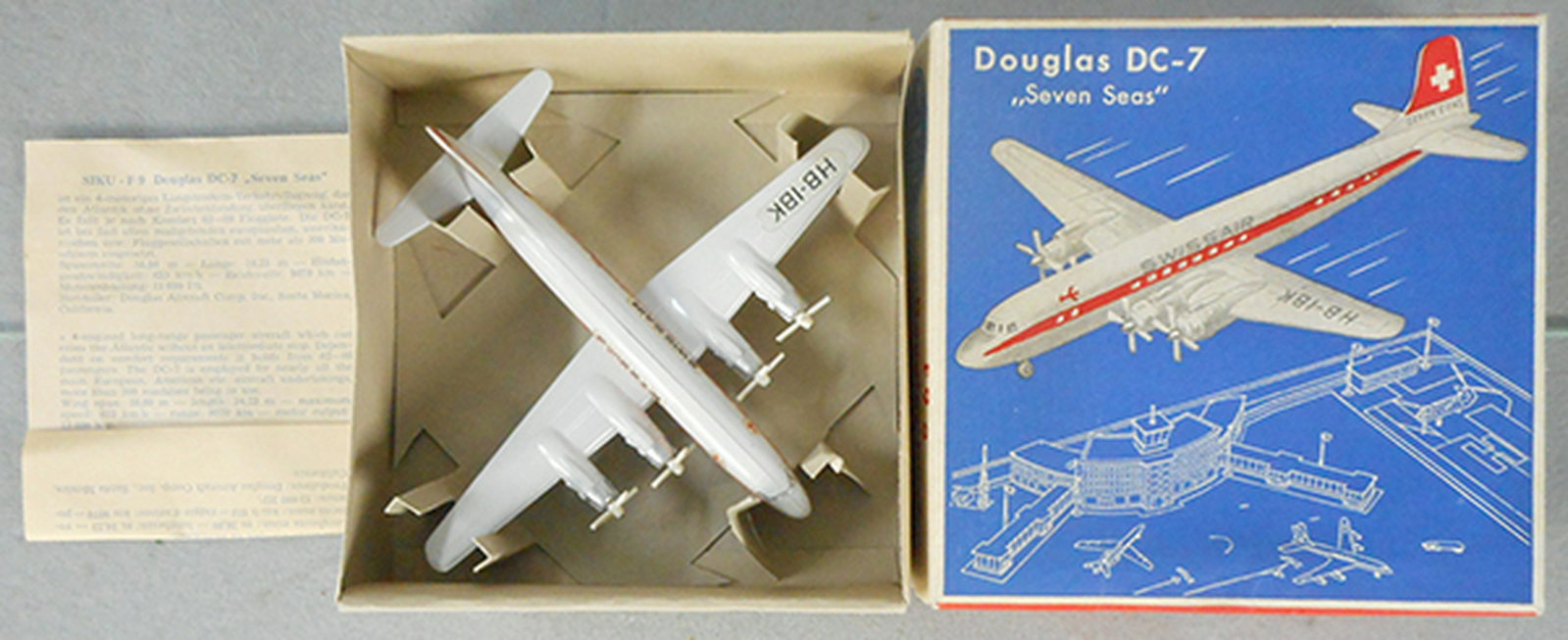 SIKU F9A DOUGLAS DC-7: plastic, 6 in wingspan, Swiss Air, w/instruction sheet, orig box & insert, C9.
