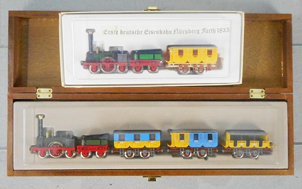 TRIX & RIVAROSSI ADLER TRAIN SETS: HO ga, 2-rail, the Trix set is powered, w/orig wood box, Rivarossi set is unpowered, orig boxes minor wear, C8-9.