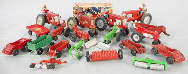 AUBURN RUBBER FARM TOYS: 3 #AF04, 3 #AF06, AF03, AF01 Tractors, AI02 Trailer, 2 #AI04 Spreaders, 2 #AI05 Spreaders, AI06 Seeder w/broken hitch, AI10 Cultipacker, AI08 Plow, AI03 Thresher, missing chute, AI15 Haywagon, incom, 