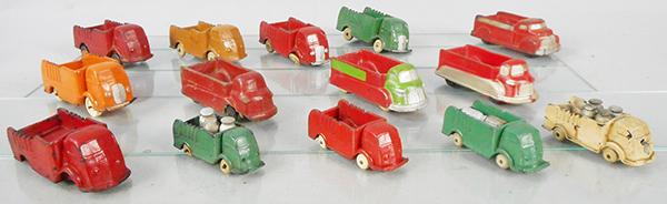 AUBURN RUBBER TRUCKS: 2 #AT01, 4 #AT02, 2 #AT03, AT05, 3 #AT08, AT10, AT19, missing 7 tires, some warping & cracking, C4-6.