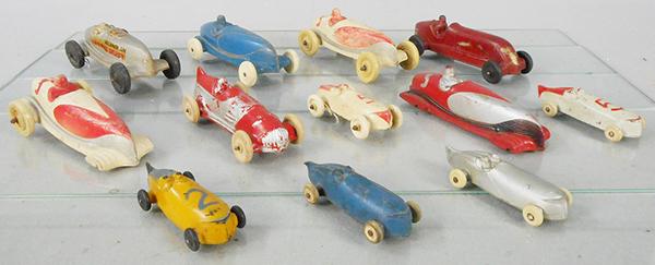 RUBBER RACE CARS: Sun Rubber 5 #SR01, 1 has chips, 5 #SR03, 2 are missing wheels, 1 chipped, Auburn AR05 & AR06, C4--6.