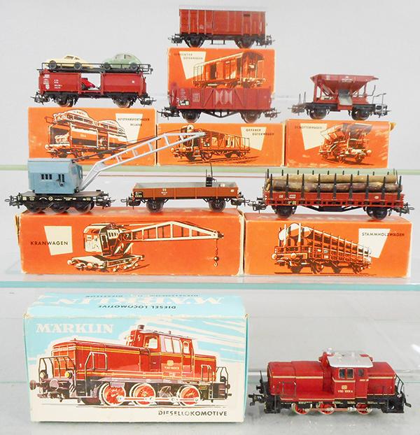 MARKLIN TRAIN SET: HO ga, 3065 diesel loco, 313-2H log car, 315-2 crane w/support car, 315-1 hopper, 312-1 box car, 315-4G Auto Transport w/cars, orig boxes minor wear, C7-8.