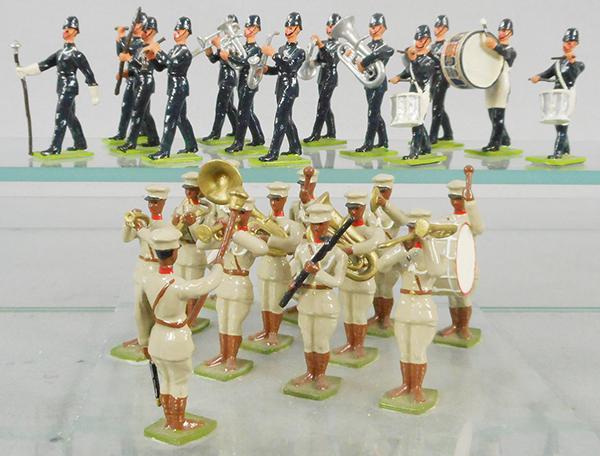 2 SOLDIER BANDS: 13 piece Police Band, 12 piece Nigerian Band, mounted on plexiglass, C7-9.