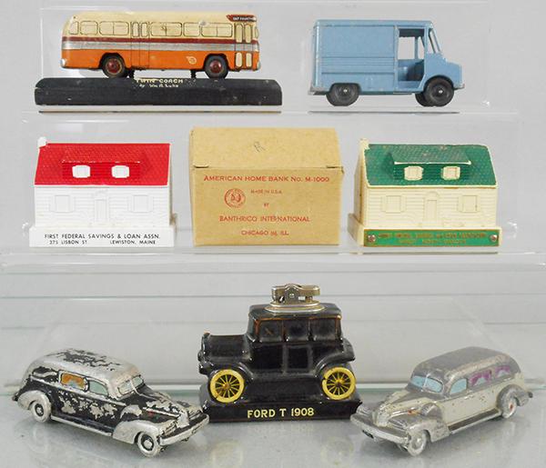 TOYS AND BANKS: Twin Coach, carved wood, 5 1/2 in, International Metro Bank, 4 1/2 in, 2 Banthrico Banks, plastic, 3 5/8 in, 1 orig box, 2 Hearse Promos, aluminum, 5 1/2 in, Ford Model T, ceramic, 4 in long, C4-8.