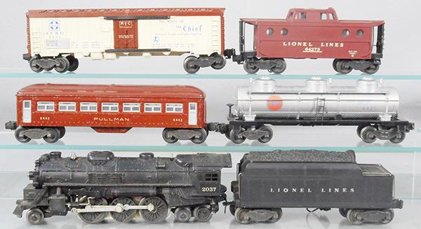 LIONEL TRAIN SET: O ga, 2037 loco, 1 step bent, 6020W tender, 6442 Pullman, 6435 Gulf tank, 6672 reefer, 6427 caboose, 1 step broken, C6-7.
