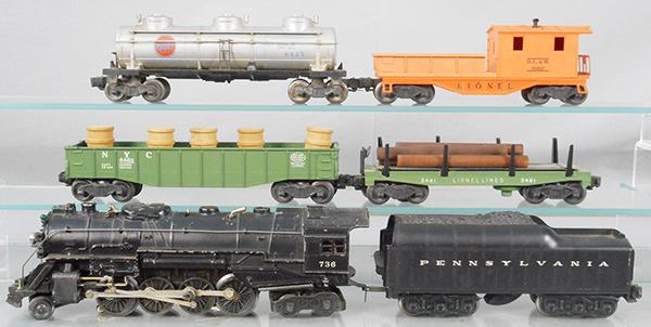 LIONEL TRAIN SET: O ga, 736 loco, 2671W tender, w/reproduction shell, 6462 NYC gondola w/barrels, 3461 lumber dump, 6425 Gulf tanker, w/overpaint spot, 6119-25 caboose, C5-7.