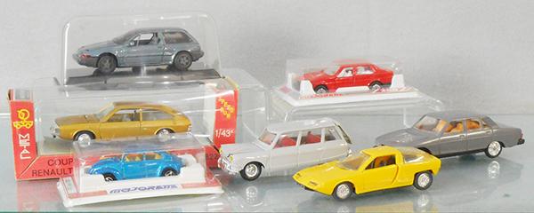 7 EUROPEAN DIE CAST & PLASTIC AUTOS: Norev 822 Coupe Renault 15 TS, die cast pimpling under paint, orig box, 182 GS Camargue Bertone, plastic, Pilen 481 Volvo, die cast, orig box, Majorette 202 VW 1302 & 271 Alfa 75, die cast, orig boxes