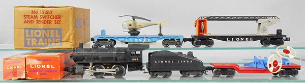LIONEL TRAIN SET: O ga, 1615LT switcher set, 6512 cherrypicker car, 3349 turbo missile launching car, 3409 helicopter car, helicopter worn, orig boxes worn, master carton missing insert, C5-6.