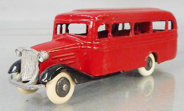 BIRK BUS: made in Denmark, black tin chassis, red die cast body, 5 1/4 in long, ca 1930s, C8-9.