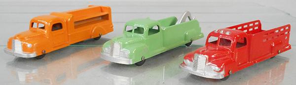 3 TOOTSIETOY INTERNATIONAL K5 TRUCKS: Bottle Truck, orange, Wrecker, green, Stake Delivery Truck, red, C6-8.