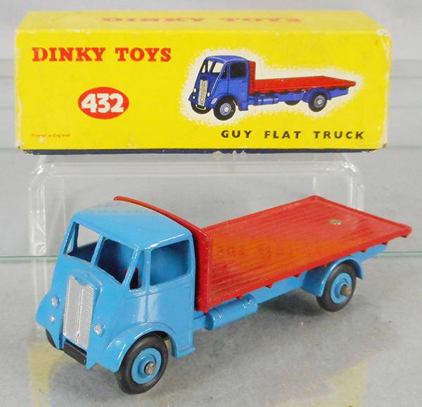 DINKY 432 GUY FLAT TRUCK: blue & red w/blue hubs, orig box minor wear, C8-9.