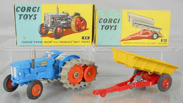2 CORGI FARM VEHICLES: 54 Fordson Tractor, blue, treads frozen, 51 Massey Ferguson Trailer, orig boxes minor wear, C8.