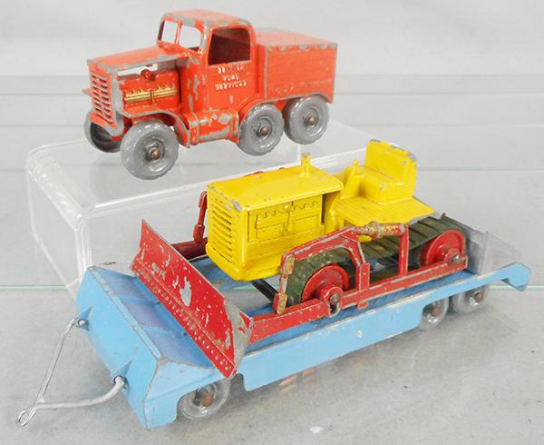 MATCHBOX LESNEY PRIME MOVER SET: orange Prime Mover w/blue Trailer & 2 silver ramps, yellow & red Bulldozer, 1 tread intact, other tread cracked, playworn, 14 in long, ca 1950, C4.