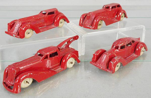 4 MANOIL AUTOS: 702 Coupe, 700 Sedan, 703 Wrecker, 701 Aerosedan, red w/white tires, C7-8.