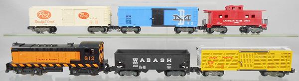 AMERICAN FLYER TRAIN SET: S ga, 21812 T&P switcher, hairline screw crack, 24213 Wabash hopper, 24076 UP stock car, 24058 post box car, 24056 B&M box car, 24603 caboose, C8-9.