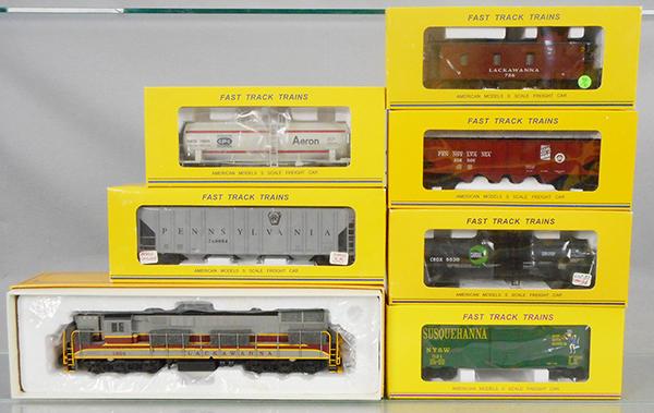AMERICAN MODELS PA TRAIN SET: S ga, 1854 Trainmaster Lackawanna loco, w/Hi-Rail, 3308 hopper, 514-36 tank, 503 tank, 1136 box car, 3458C hopper, 7514-B caboose, orig boxes & inserts, C9.