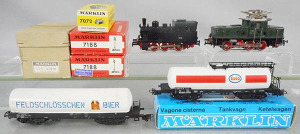 MARKLIN TRAIN LOT: HO ga, 3029 loco, CE800 loco, paint flaking, 409M catenary poles, 7022 switch, 2 #7188 signals, 4632 beer tank car, 4650 Esso tank, 5 orig boxes only, minor wear, C5-9.