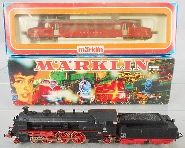 2 MARKLIN LOCOS: HO ga, 3125 Red Arrow Swiss streetcar, 3091 German steam loco & tender, minor bend in loco cab roof, orig boxes & inserts minor wear, C8.