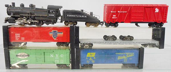 AMERICAN FLYER TRAIN SET: HO ga, 31004 switcher loco, 33818 GN stock car, 33403 BAR reefer, 33539 truck flat car, 33002 NYC box car, 33005 L&N box car, w/4 orig Kleer Pak car boxes only, C5-8.