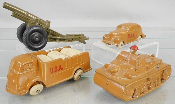 AUBURN RUBBER ARMY VEHICLES: AM03 Howitzer, 6 3/4 in long, AA11 Plymouth, 4 1/4 in long, AT02 International Truck, 5 3/8 in long, AM01 Tank, 4 1/2 in long, C7-8.