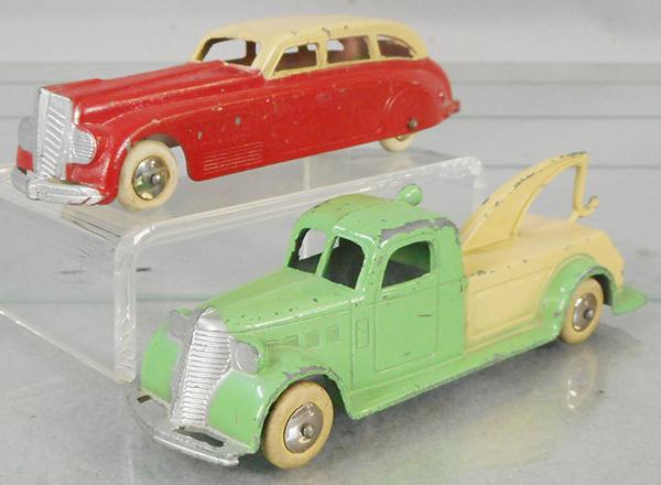 2 TOOTSIETOY JUMBOS: 1018 Sedan, cream & red, 1027 Wrecker, tan & green, both have rubber tires w/chrome hubs, C6-7.