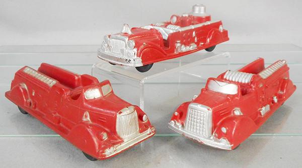 3 AUBURN RUBBER FIRE TRUCKS: AE04 Ladder Truck, AE03 Pumper, AE02 Hose & Ladder Truck, all are 7 3/4 in long, C8.
